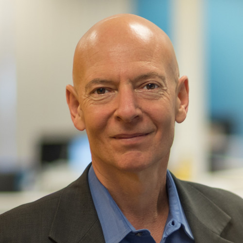 Andrew Shatte’, Chief Knowledge Officer and Co-Founder at meQuilibrium seen in blue color shirt and dark olive color suit
